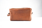 Rogue Industries' Leather Dopp Kit, designed as a stylish shave kit with handles on both sides, showcased against a plain white background.