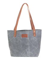 The durable Allagash River tote bag with brown leather handles by Rogue Industries.