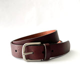 A brown Rogue Industries Chamberlain Belt and Minimalist Wallet Bundle on a white background.