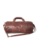 A Seal Cove by Rogue Industries leather duffle bag on a white background.