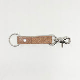 A tan, durable Rogue Industries leather keychain on a white background.